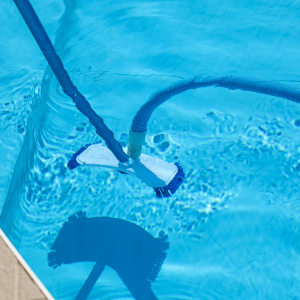 Vacuuming Pool weekly pool service